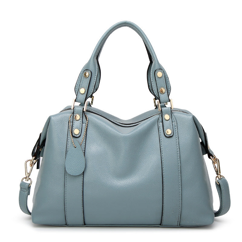 Modische Damenhandtasche in Hellblau mit Lychee-Struktur, goldenen Details und abnehmbarem Schultergurt -Vorderansicht