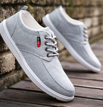 Herren Canvas Sneaker in Grau mit Schnürung, atmungsaktive Freizeitschuhe für Frühling bis Herbst.