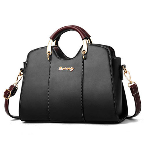 Elegante schwarze Damenhandtasche mit goldenen DEtails und Schulterriemen - vielseitig für Alltag und Büro
