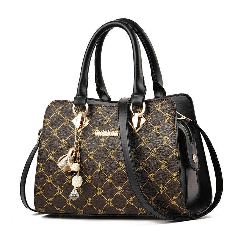 Damen Handtasche mit geometrischem Muster, PU-Leder, stabiler Henkel, optionaler Schulterriemen, Anhänger, modern und stilvoll.
